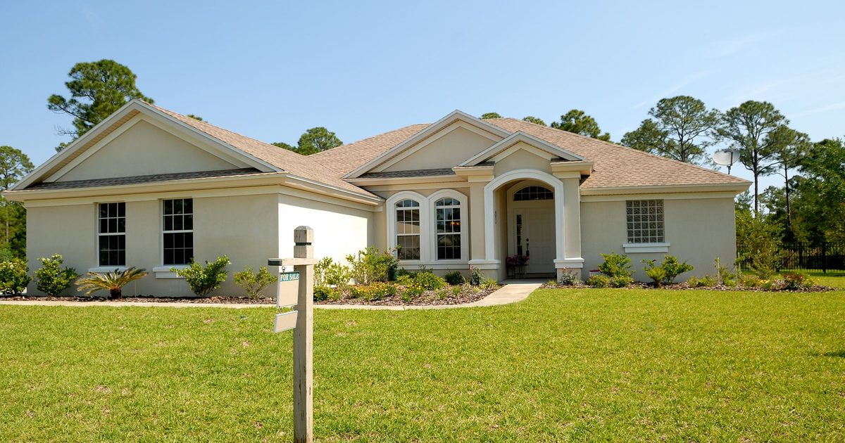 Lush private backyard lawn and perimeter garden defense
